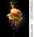 A burger, piled high with juicy beef, melted cheese, crisp lettuce, and tangy pickles. 105344020