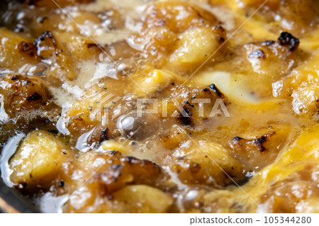 Yakitori (Bonjiri) cooking scene with eggs. Leftover yakitori remake image. Yakitori (Bonjiri) cooking scene with eggs. Leftover yakitori remake image. 105344280