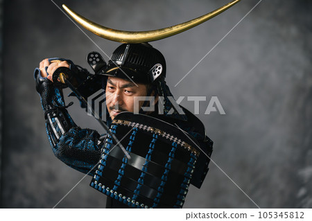 Shooting scenery of a man wearing armor Shooting scenery of a man wearing armor 105345812