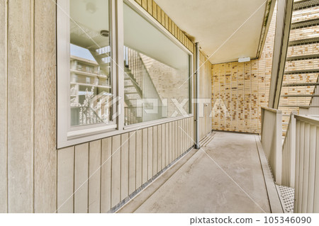 an outside area that is very clean and has no people on it or any other place to see the reflection in the window an outside area that is very clean and has no people on it or any other place to see the reflection in the window 105346090