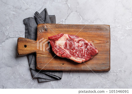 Raw beef ribeye steak Raw beef ribeye steak 105346091