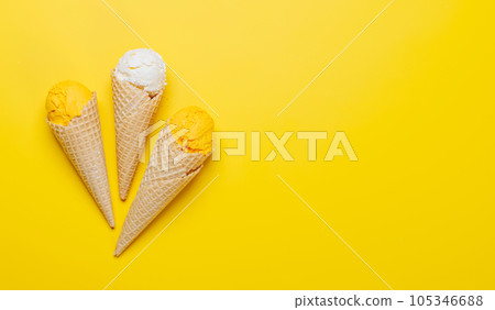 Assorted ice cream flavours in delightful waffle cones 105346688