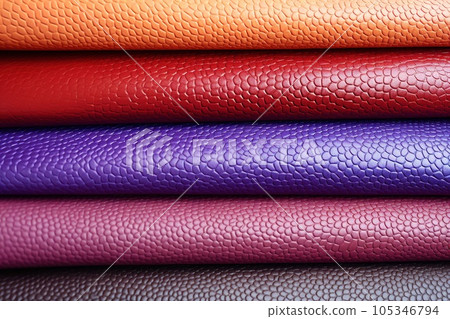 Close up multicolor of leathers background. folded leathers texture. Faux leather fabric, leatherette fabric for clothing Close up multicolor of leathers background. folded leathers texture. Faux leather fabric, leatherette fabric for clothing 105346794