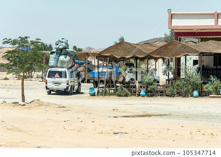 View across rural egypt near river Nile in Egypt rural countryside landscape with african houses 105347714