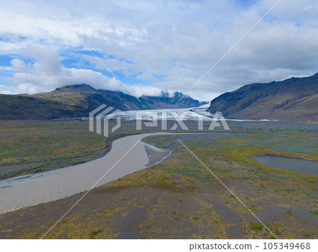 Aerial top view of iceberg and glacier in Iceland Aerial top view of iceberg and glacier in Iceland 105349468