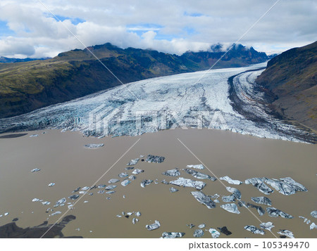 Aerial top view of iceberg and glacier in Iceland Aerial top view of iceberg and glacier in Iceland 105349470