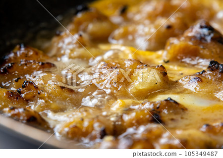 Yakitori (Bonjiri) cooking scene with eggs. Leftover yakitori remake image. Yakitori (Bonjiri) cooking scene with eggs. Leftover yakitori remake image. 105349487