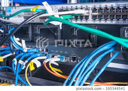 Detail of server room with patch cables Detail of server room with patch cables 105349541