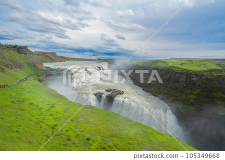 Gullfoss waterfall in summer season in Iceland. Famous nature landscape background 105349668