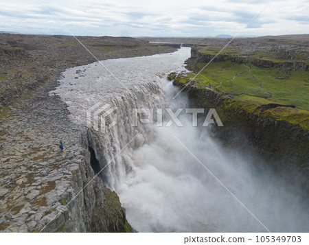 Dettifoss waterfall in summer season in Iceland. Famous nature landscape background 105349703