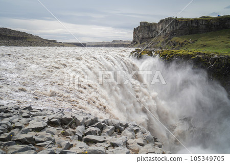 Dettifoss waterfall in summer season in Iceland. Famous nature landscape background Dettifoss waterfall in summer season in Iceland. Famous nature landscape background 105349705