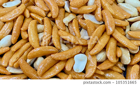 Background image of persimmon seeds and peanuts Background image of persimmon seeds and peanuts 105351665