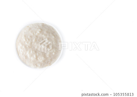 Rice pudding. Arroz con leche. Rice pudding in white bowl isolated on white background. 105355813