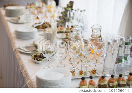 Buffet table with dishes and snacks 105356644