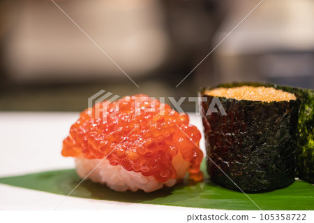 Sujiko nigiri sushi and ice fish roe warship roll sushi. Sujiko nigiri sushi and ice fish roe warship roll sushi. 105358722