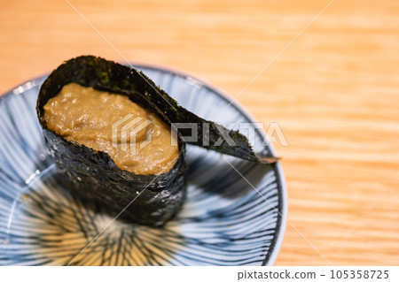 Japanese Gunkanmaki Sushi. Crab miso with snow crab. Japanese Gunkanmaki Sushi. Crab miso with snow crab. 105358725