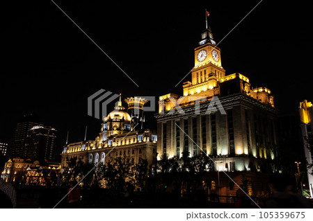 The Bund or Waitan in Shanghai, China. The Bund is a riverfront area in central Shanghai with many historic buildings. 105359675