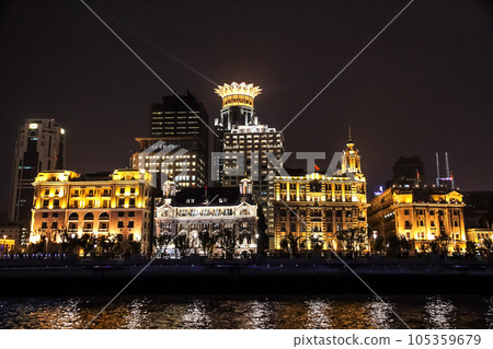 The Bund or Waitan in Shanghai, China. The Bund is a riverfront area in central Shanghai with many historic buildings. The Bund or Waitan in Shanghai, China. The Bund is a riverfront area in central Shanghai with many historic buildings. 105359679