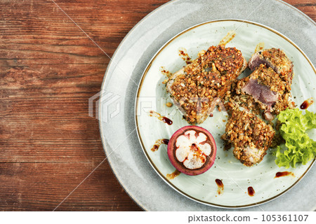 Tuna steak with mangosteens. 105361107