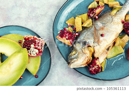 Dorado fish roasted with melon. Dorado fish roasted with melon. 105361113