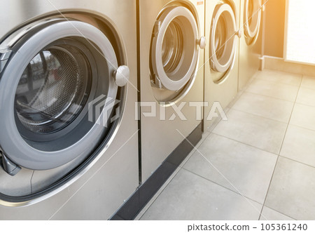 Laundromat Service, Line of Laundry Machines, Commercial Laundrette, Public Launderette Washer 105361240