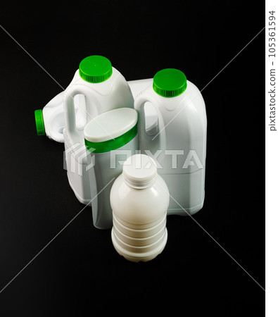 Empty Plastic Milk Bottle, Crumpled White Plastic Bottle, Global Pollution Concept, Squashed Pet Bottles Empty Plastic Milk Bottle, Crumpled White Plastic Bottle, Global Pollution Concept, Squashed Pet Bottles 105361594