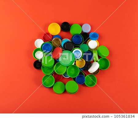 Plastic Bottle Caps Pile. Recycling HDPE Material Group, Circle Polyethylene Lid Set, Colorful Caps Group Plastic Bottle Caps Pile. Recycling HDPE Material Group, Circle Polyethylene Lid Set, Colorful Caps Group 105361834