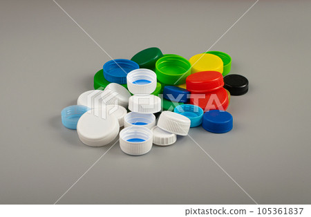 Plastic Bottle Caps Pile. Recycling HDPE Material Group, Circle Polyethylene Lid Set, Colorful Caps Group 105361837