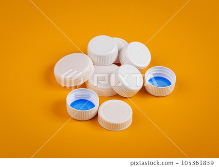 Plastic Bottle Caps Pile. Recycling HDPE Material Group, Circle Polyethylene Lid Set, Colorful Caps Group 105361839