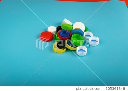 Plastic Bottle Caps Pile. Recycling HDPE Material Group, Circle Polyethylene Lid Set, Colorful Caps Group Plastic Bottle Caps Pile. Recycling HDPE Material Group, Circle Polyethylene Lid Set, Colorful Caps Group 105361846
