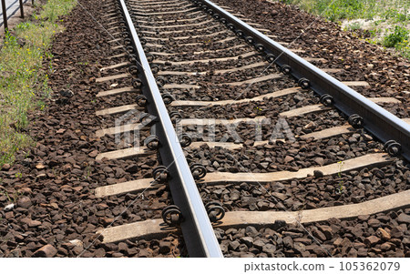 Railway Lines Closeup, Train Tracks with Track Ballast Stones, Metal Rails, Old Railway Track 105362079
