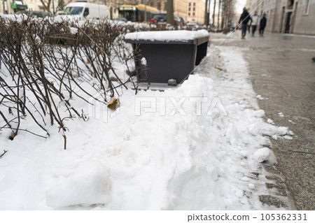Wooden Bench in Snow, Frozen Winter Park, Outdoor City Architecture, Empty Plank Seat in Snowfall, Seasonal Travel Wooden Bench in Snow, Frozen Winter Park, Outdoor City Architecture, Empty Plank Seat in Snowfall, Seasonal Travel 105362331