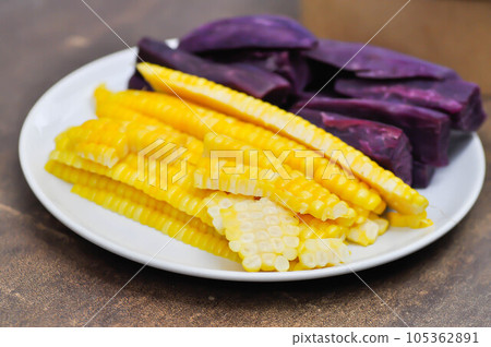 steamed corn and steamed purple sweet potato steamed corn and steamed purple sweet potato 105362891