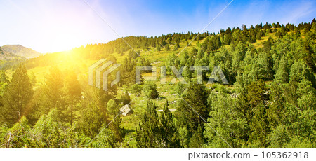 Picturesque mountains and sunrise. Wide photo. Picturesque mountains and sunrise. Wide photo. 105362918