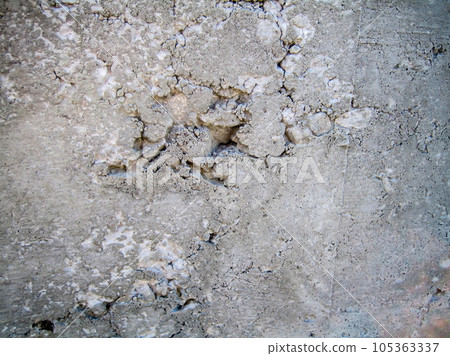 Air pocket in a concrete wall caused by clumped aggregate. 105363337
