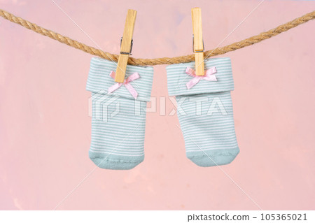 Baby socks on a clothesline. Baby clothes washing 105365021
