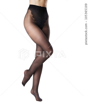 Legs of a woman in black capron tights on white background Legs of a woman in black capron tights on white background 105365109