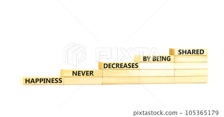 Happiness symbol. Concept words Happiness never decreases by being shared on wooden block. Beautiful white table white background. Motivational Happiness concept. Copy space. 105365179