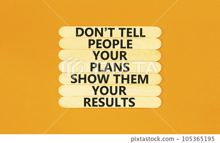 Plan or result symbol. Concept words Do not tell people your plans show them your results on wooden stick on beautiful orange table orange background. Business plan or result concept. Copy space. Plan or result symbol. Concept words Do not tell people your plans show them your results on wooden stick on beautiful orange table orange background. Business plan or result concept. Copy space. 105365195