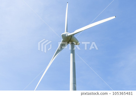 Close-up of wind power systems with blue sky background on the west coast of Taiwan. Close-up of wind power systems with blue sky background on the west coast of Taiwan. 105365481