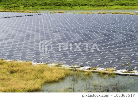 View of the floating Solar power system on the flood detention basin in Kaohsiung, Taiwan. View of the floating Solar power system on the flood detention basin in Kaohsiung, Taiwan. 105365517
