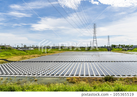View of the floating Solar power system on the flood detention basin in Kaohsiung, Taiwan. View of the floating Solar power system on the flood detention basin in Kaohsiung, Taiwan. 105365519