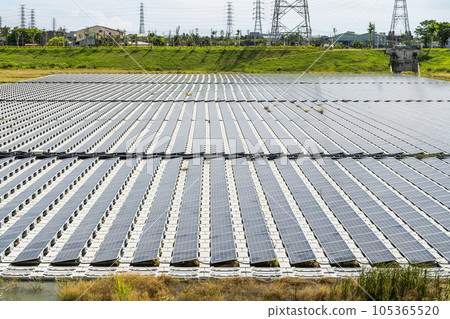 View of the floating Solar power system on the flood detention basin in Kaohsiung, Taiwan. View of the floating Solar power system on the flood detention basin in Kaohsiung, Taiwan. 105365520