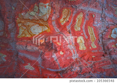 Colorful pattern in the rock. Natural background 105366548