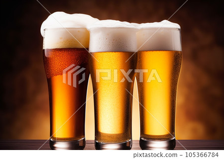 Glasses of cold beer with foam, pint of original premium beer drink, alcohol flavour and holiday celebration 105366784