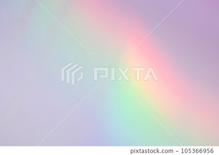 Holographic rainbow gradient color light refraction overlay effect on white wall 105366956