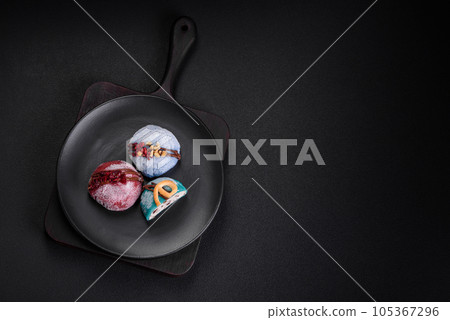 Delicious sweet colorful mochi desserts or ice cream with rice dough and toppings 105367296