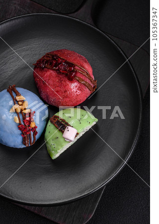 Delicious sweet colorful mochi desserts or ice cream with rice dough and toppings 105367347