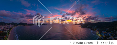The sky changes color from yellow to red as the sun sets over the sea..sunset landscape amazing light of nature cloudscape sky. .Big sun and red lighting sky background. 4k resolution The sky changes color from yellow to red as the sun sets over the sea..sunset landscape amazing light of nature cloudscape sky. .Big sun and red lighting sky background. 4k resolution 105372140