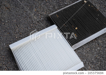 Dirty and new car cabin air filters. Timely car service.  105375694